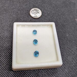 Set of 3 oval blue zircons